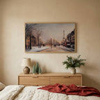 Paris street in snow Christmas TV art above an oak dresser with small bottle-brush trees in a calm bedroom