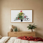 Scribble Christmas tree TV art above an oak dresser with small bottle-brush trees in a calm bedroom
