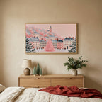 Pink Christmas village TV art above an oak dresser with small bottle-brush trees in a calm bedroom