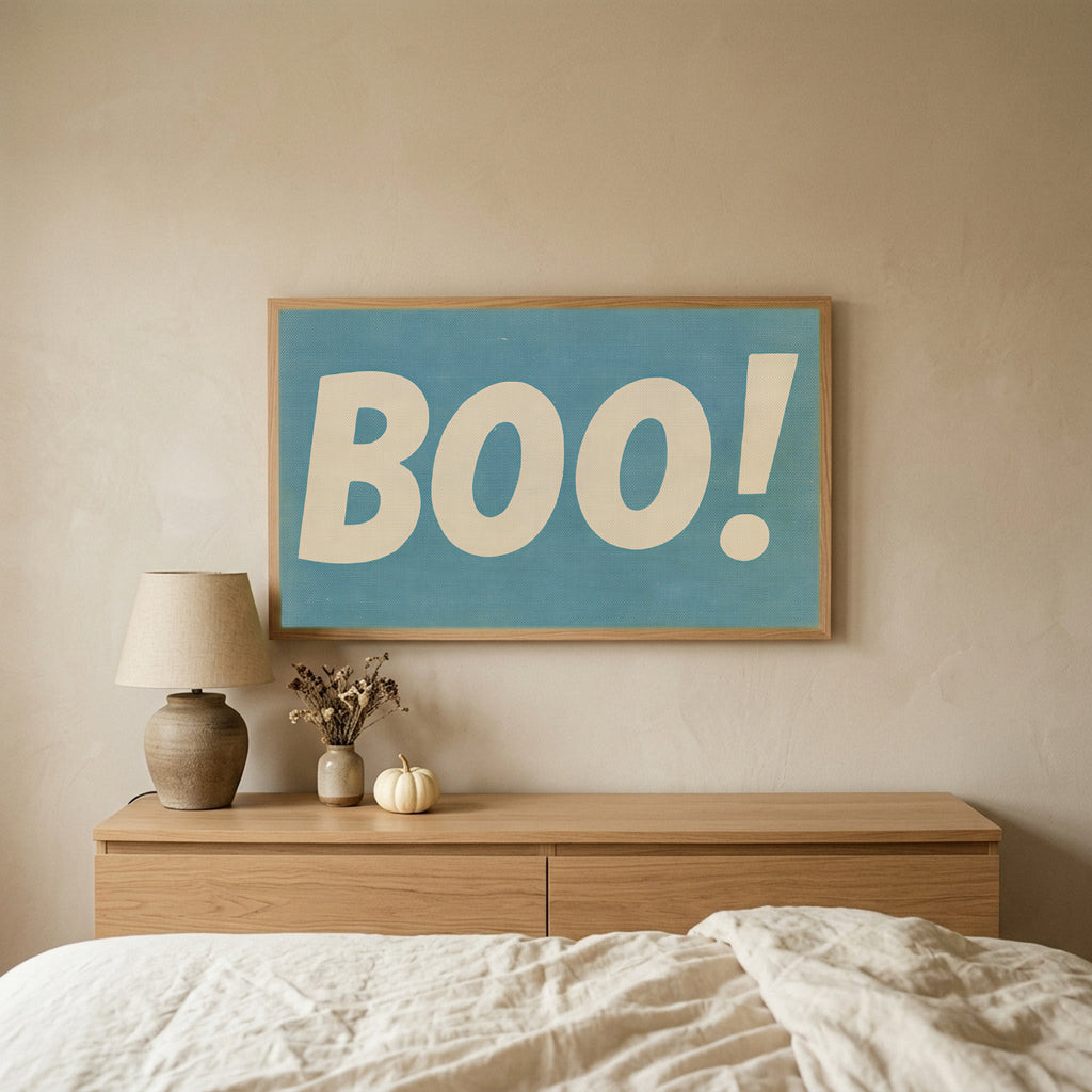 Retro Boo Halloween TV art above an oak dresser in a calm bedroom