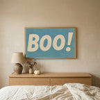 Retro Boo Halloween TV art above an oak dresser in a calm bedroom