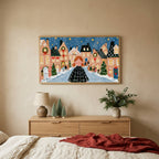 Gingerbread village Christmas TV art above an oak dresser with small bottle-brush trees in a calm bedroom