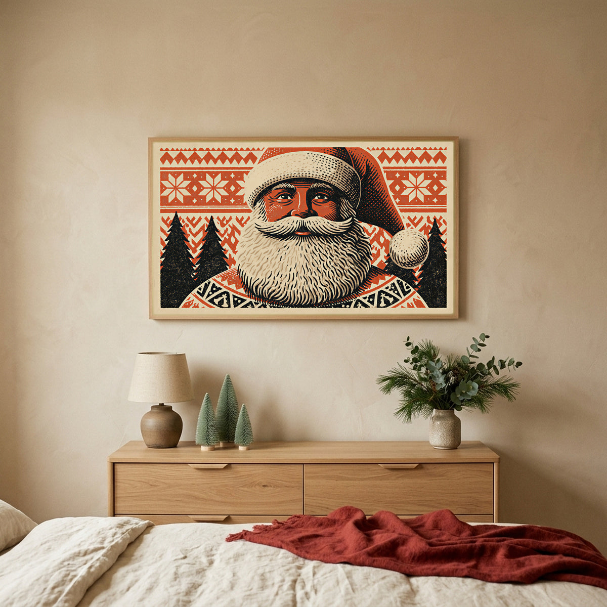 Santa portrait TV art above an oak dresser with small bottle-brush trees in a calm bedroom