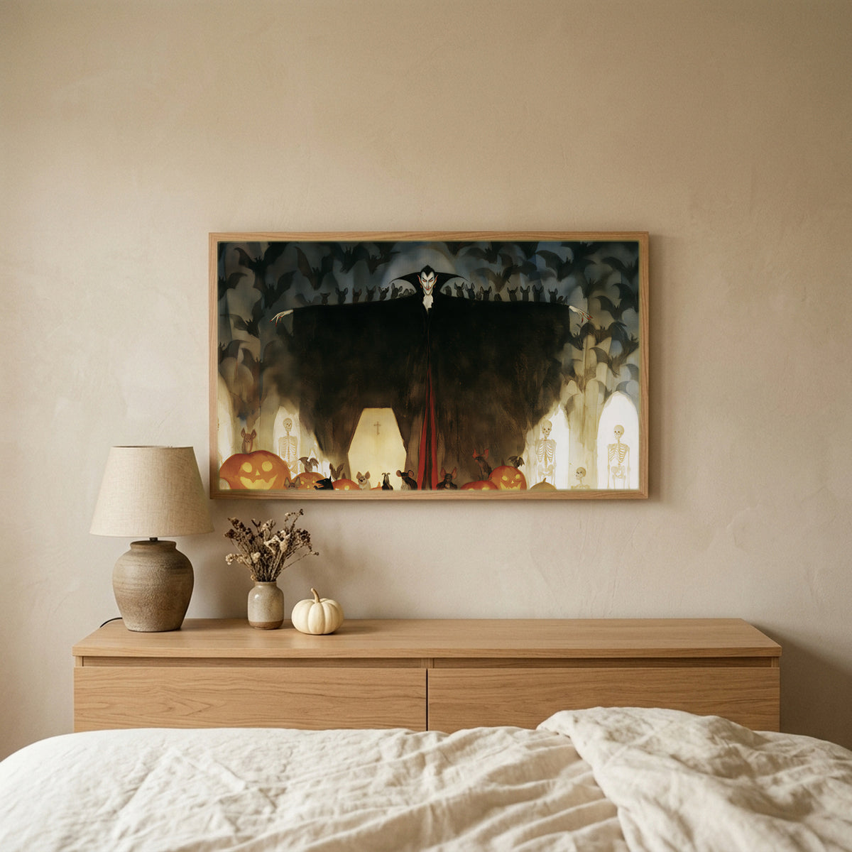 Vampire Halloween TV art above an oak dresser in a calm bedroom
