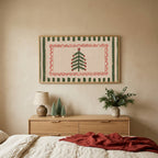 Folk Christmas tree TV art above an oak dresser with small bottle-brush trees in a calm bedroom