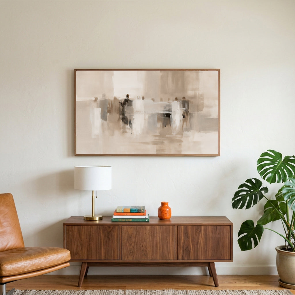 Neutral abstract figures art on a TV above a walnut credenza with a brass lamp and a monstera plant