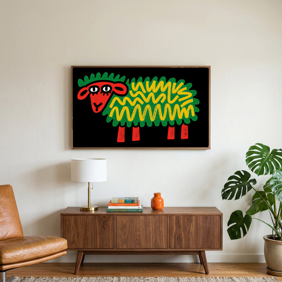 Pop art sheep art on a TV above a walnut credenza with a brass lamp and a monstera plant