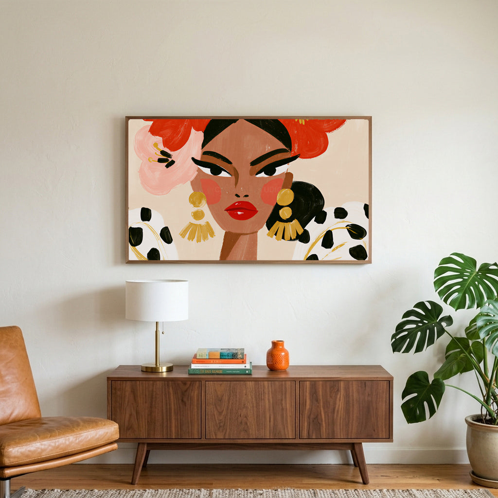 Fashion portrait art on a TV above a walnut credenza with a brass lamp and a monstera plant