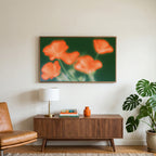 Blurred orange poppies art on a TV above a walnut credenza with a brass lamp and a monstera plant