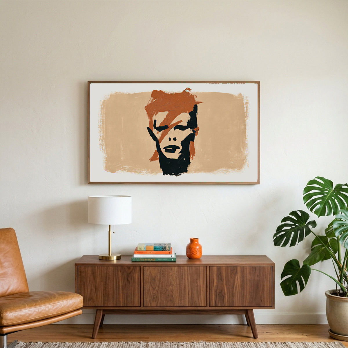 Lightning bolt portrait art on a TV above a walnut credenza with a brass lamp and a monstera plant