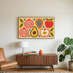 Colorful fruit halves art on a TV above a walnut credenza with a brass lamp and a monstera plant