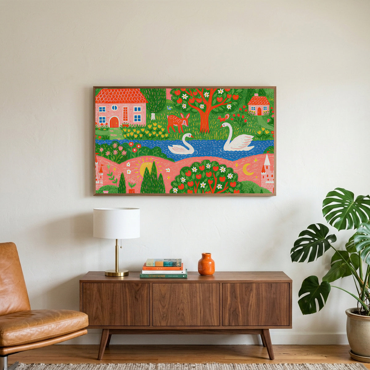 Storybook village with swans art on a TV above a walnut credenza with a brass lamp and a monstera plant