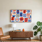 Doodle faces art on a TV above a walnut credenza with a brass lamp and a monstera plant