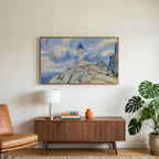 Lighthouse on a cliff art on a TV above a walnut credenza with a brass lamp and a monstera plant