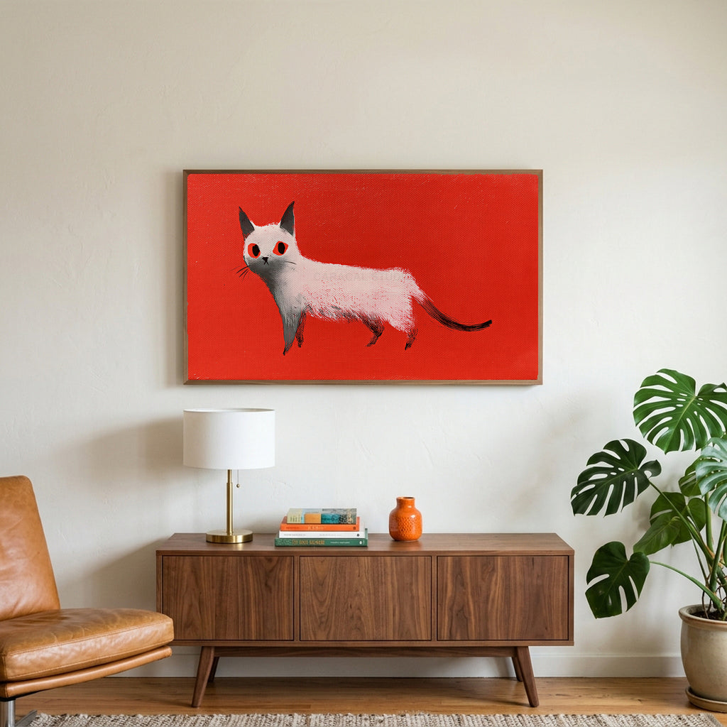 White cat art on a TV above a walnut credenza with a brass lamp and a monstera plant