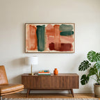 Boho brushstroke art on a TV above a walnut credenza with a brass lamp and a monstera plant