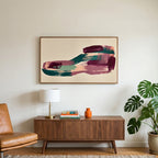 Abstract plum and teal brushstrokes art on a TV above a walnut credenza with a brass lamp and a monstera plant