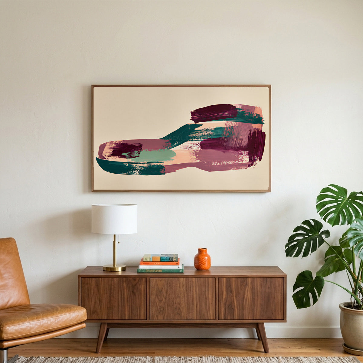 Abstract plum and teal brushstrokes art on a TV above a walnut credenza with a brass lamp and a monstera plant
