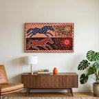 Folk star horses art on a TV above a walnut credenza with a brass lamp and a monstera plant