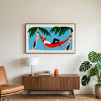 Hammock art on a TV above a walnut credenza with a brass lamp and a monstera plant