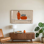 Minimalist table with jug and wine glasses art on a TV above a walnut credenza with a brass lamp and a monstera plant