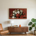 White lilies in a red vase art on a TV above a walnut credenza with a brass lamp and a monstera plant
