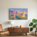 Blurred meadow runners art on a TV above a walnut credenza with a brass lamp and a monstera plant