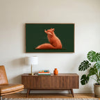 Fox and robin art on a TV above a walnut credenza with a brass lamp and a monstera plant