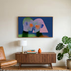 Heart cheek portrait art on a TV above a walnut credenza with a brass lamp and a monstera plant