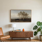 Birch trees landscape art on a TV above a walnut credenza with a brass lamp and a monstera plant