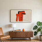Red block face art on a TV above a walnut credenza with a brass lamp and a monstera plant