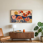 Mid century poppies art on a TV above a walnut credenza with a brass lamp and a monstera plant