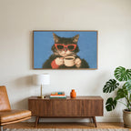 Coffee cat in sunglasses art on a TV above a walnut credenza with a brass lamp and a monstera plant