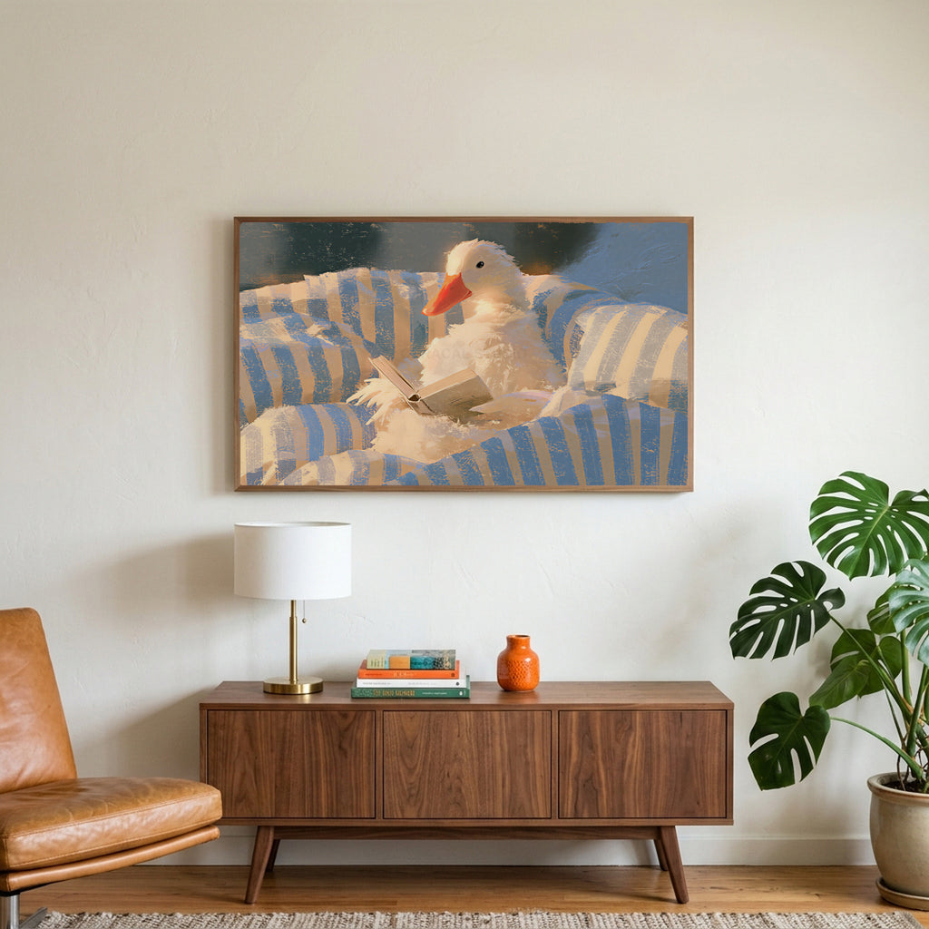 Duck reading in bed art on a TV above a walnut credenza with a brass lamp and a monstera plant