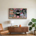 Black cat at a tea party art on a TV above a walnut credenza with a brass lamp and a monstera plant