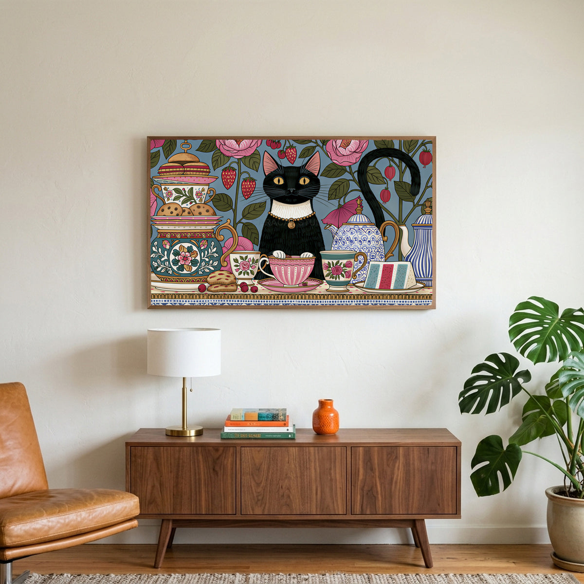 Black cat at a tea party art on a TV above a walnut credenza with a brass lamp and a monstera plant