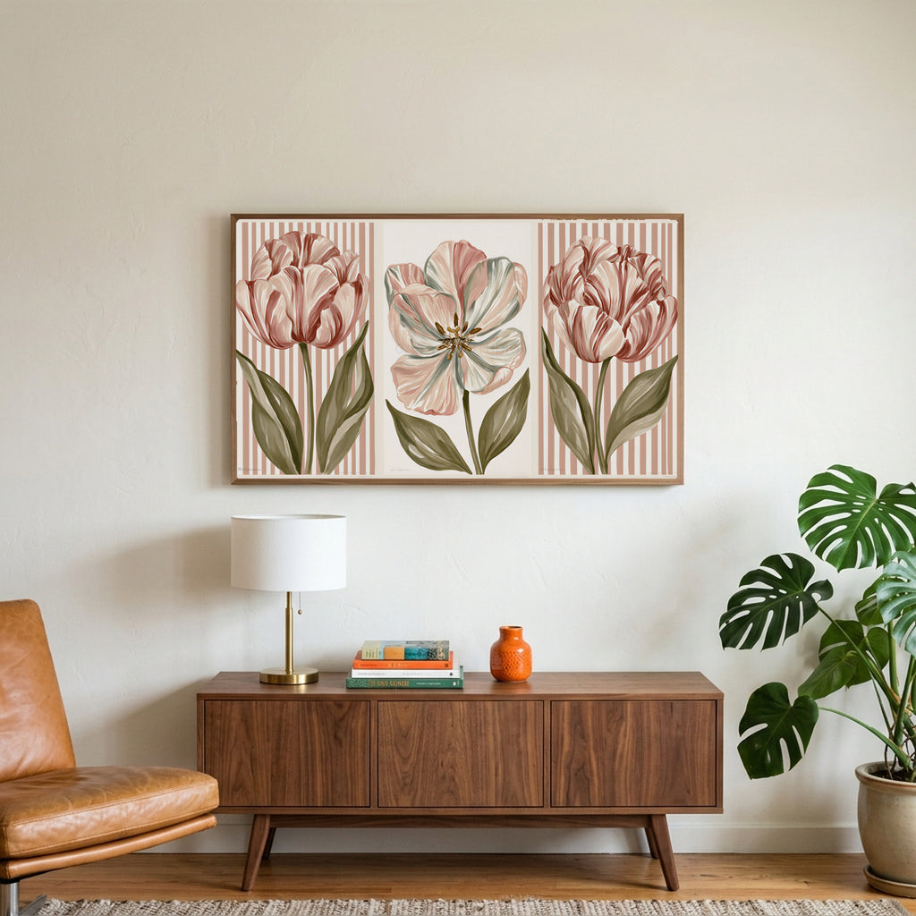 Tulip trio art on a TV above a walnut credenza with a brass lamp and a monstera plant