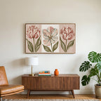 Tulip trio art on a TV above a walnut credenza with a brass lamp and a monstera plant