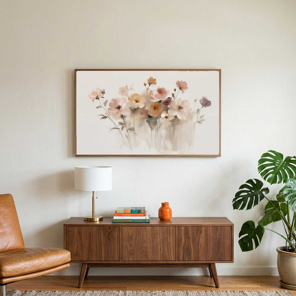 Soft wildflowers art on a TV above a walnut credenza with a brass lamp and a monstera plant