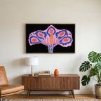 Surreal flower art on a TV above a walnut credenza with a brass lamp and a monstera plant