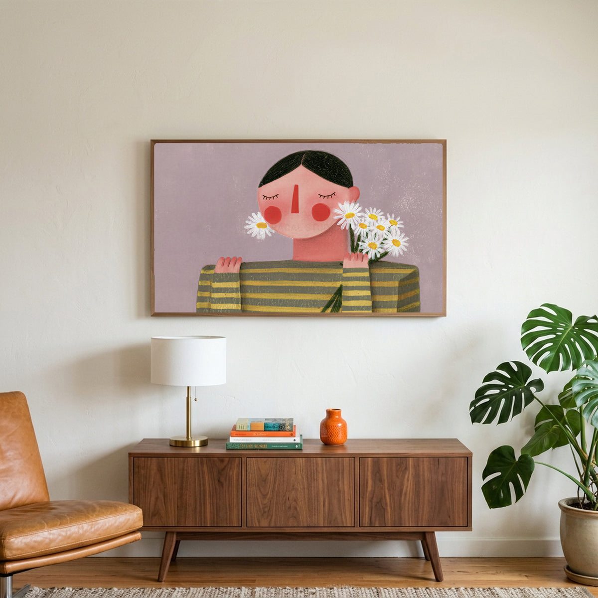 Rosy cheeks daisy portrait art on a TV above a walnut credenza with a brass lamp and a monstera plant