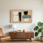 Mid century abstract shapes art on a TV above a walnut credenza with a brass lamp and a monstera plant