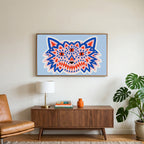 Three-eyed wolf art on a TV above a walnut credenza with a brass lamp and a monstera plant