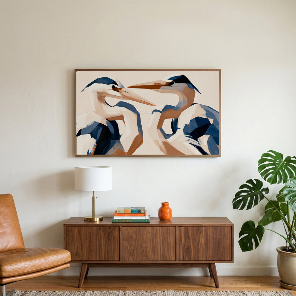 Blue heron art on a TV above a walnut credenza with a brass lamp and a monstera plant