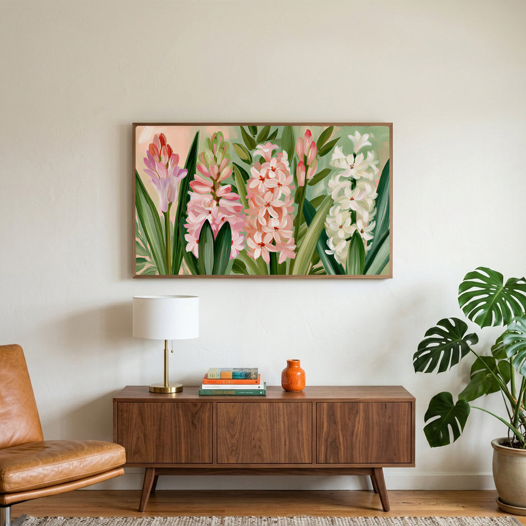 Spring hyacinths art on a TV above a walnut credenza with a brass lamp and a monstera plant