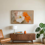 Poppy art on a TV above a walnut credenza with a brass lamp and a monstera plant