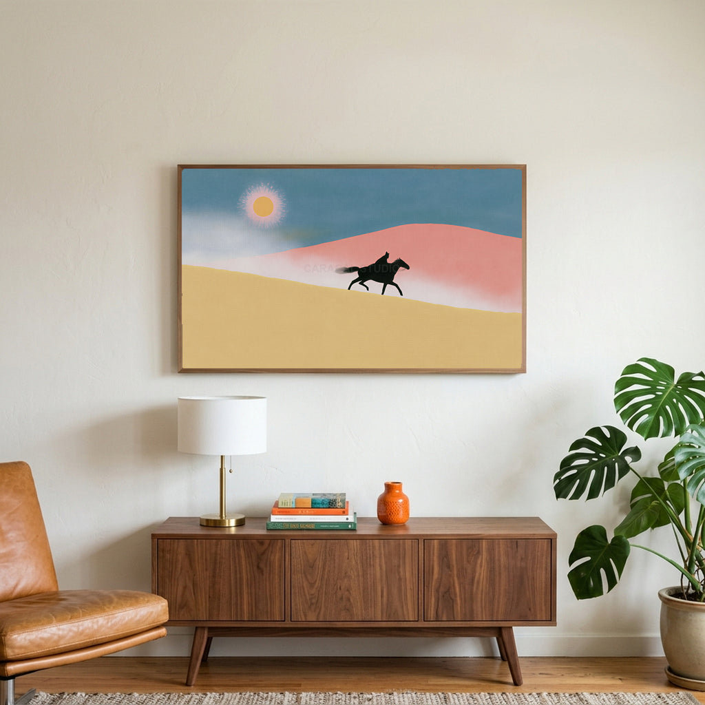 Rider in the desert art on a TV above a walnut credenza with a brass lamp and a monstera plant