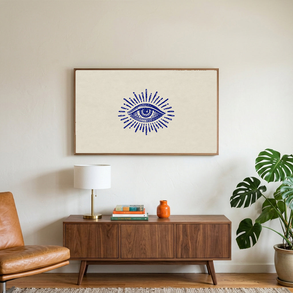 Mystic eye art on a TV above a walnut credenza with a brass lamp and a monstera plant