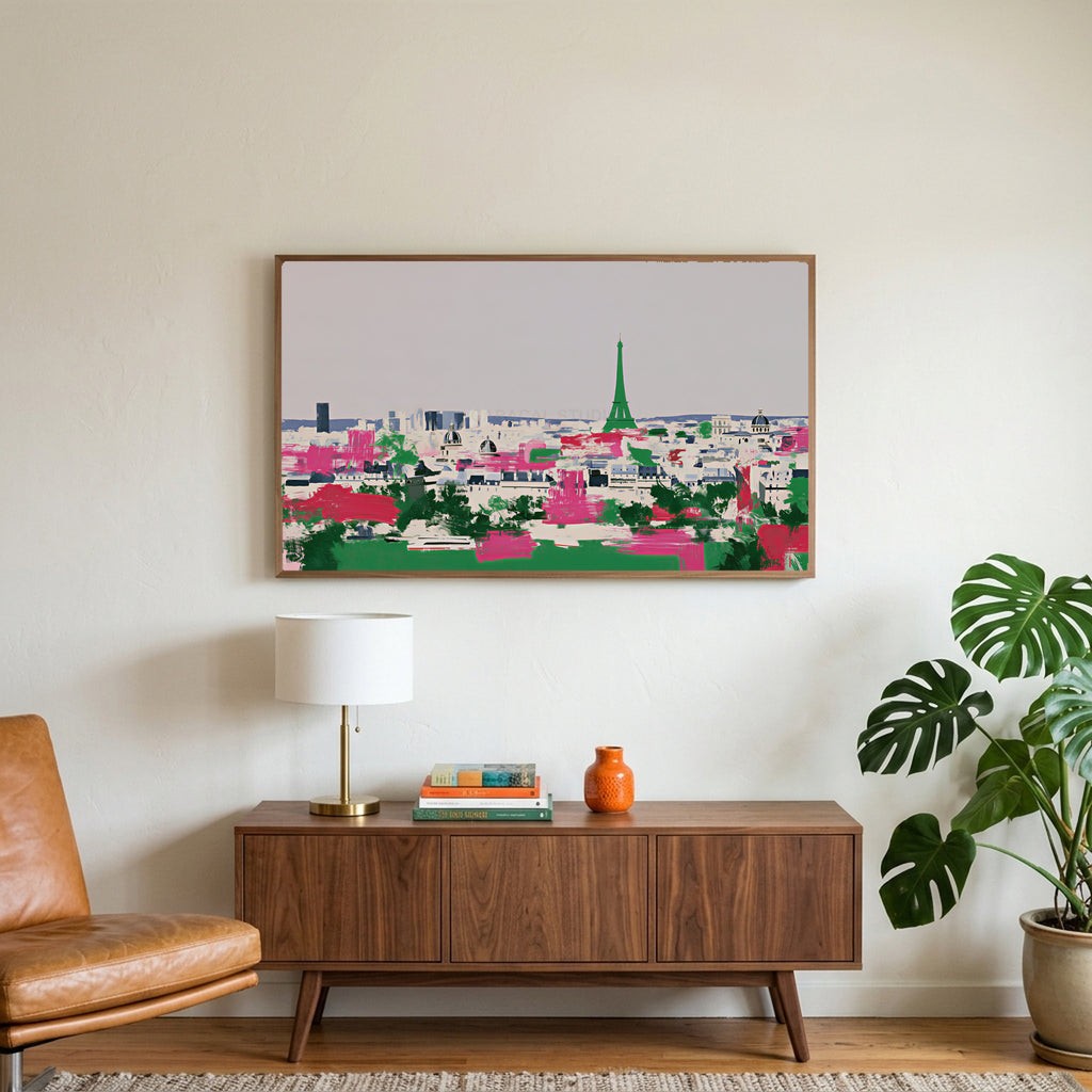 Paris skyline art on a TV above a walnut credenza with a brass lamp and a monstera plant
