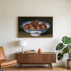 Pears in a porcelain bowl art on a TV above a walnut credenza with a brass lamp and a monstera plant